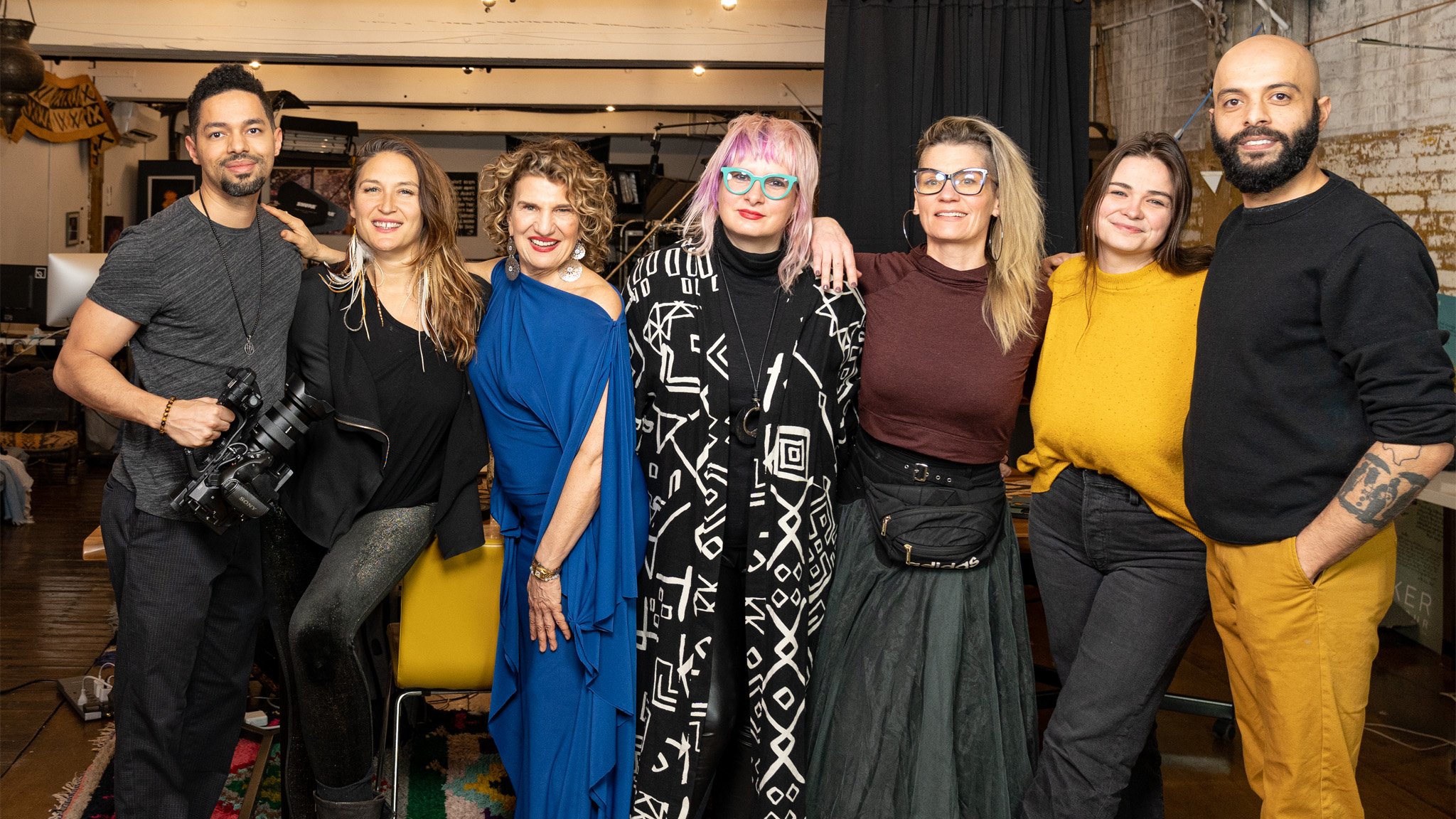 Mama Gena aka Regena Thomashauer poses with video masterclass crew, Brooklyn New York