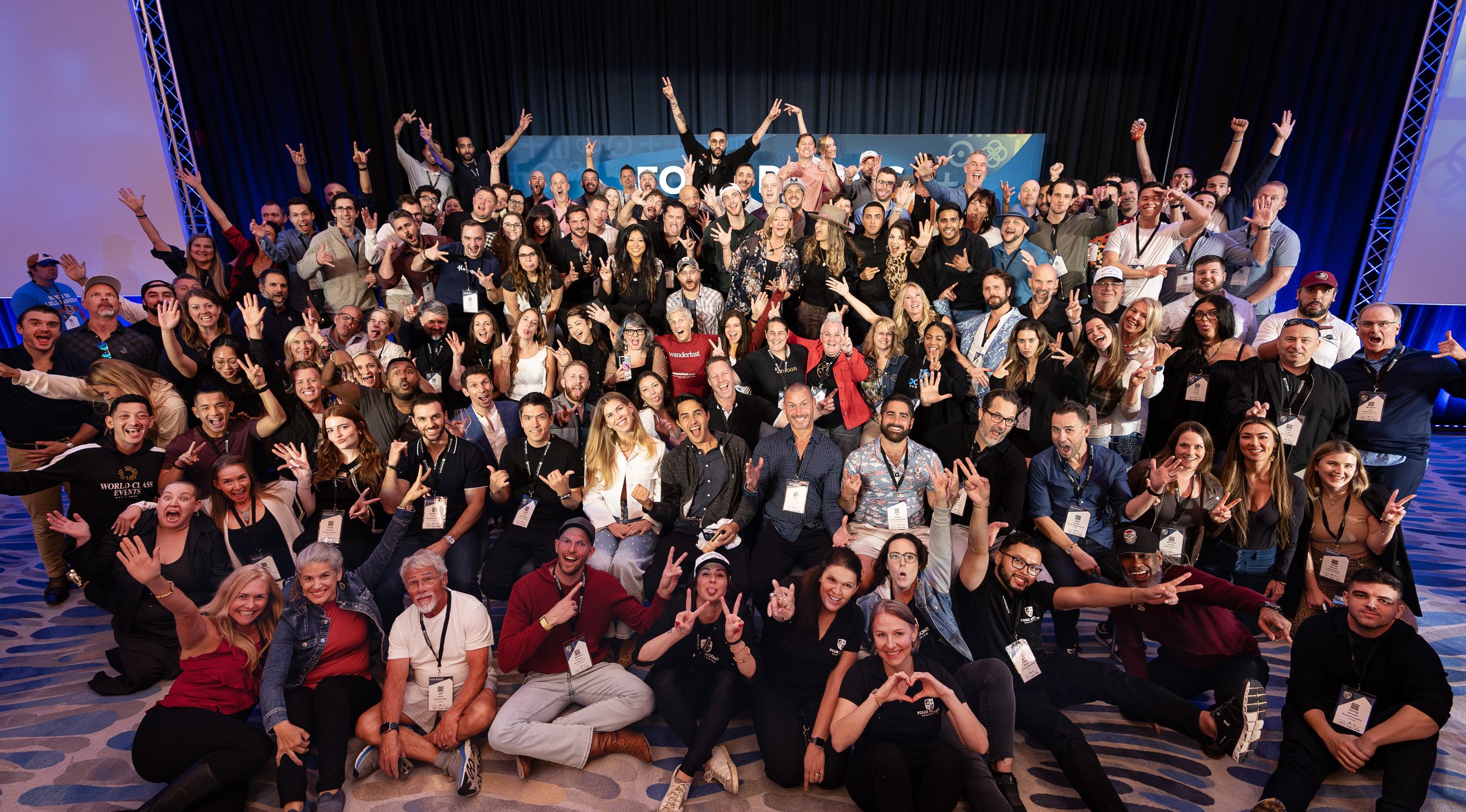 The Four Rooms Mastermind poses for a group picture, Orlando FL